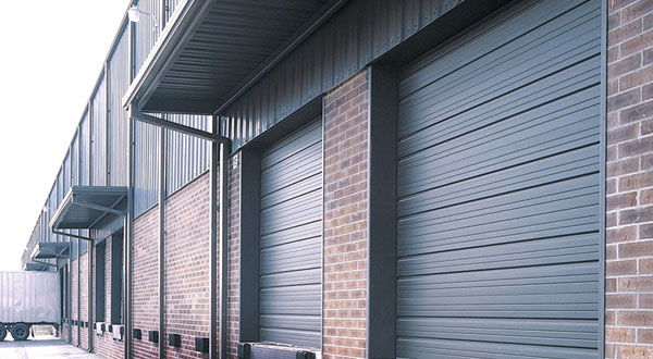 Sectional steel commercial door